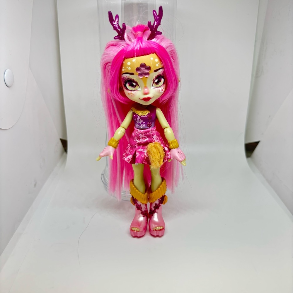 Pink and Green Doll with Vibrant Hair and Accessories